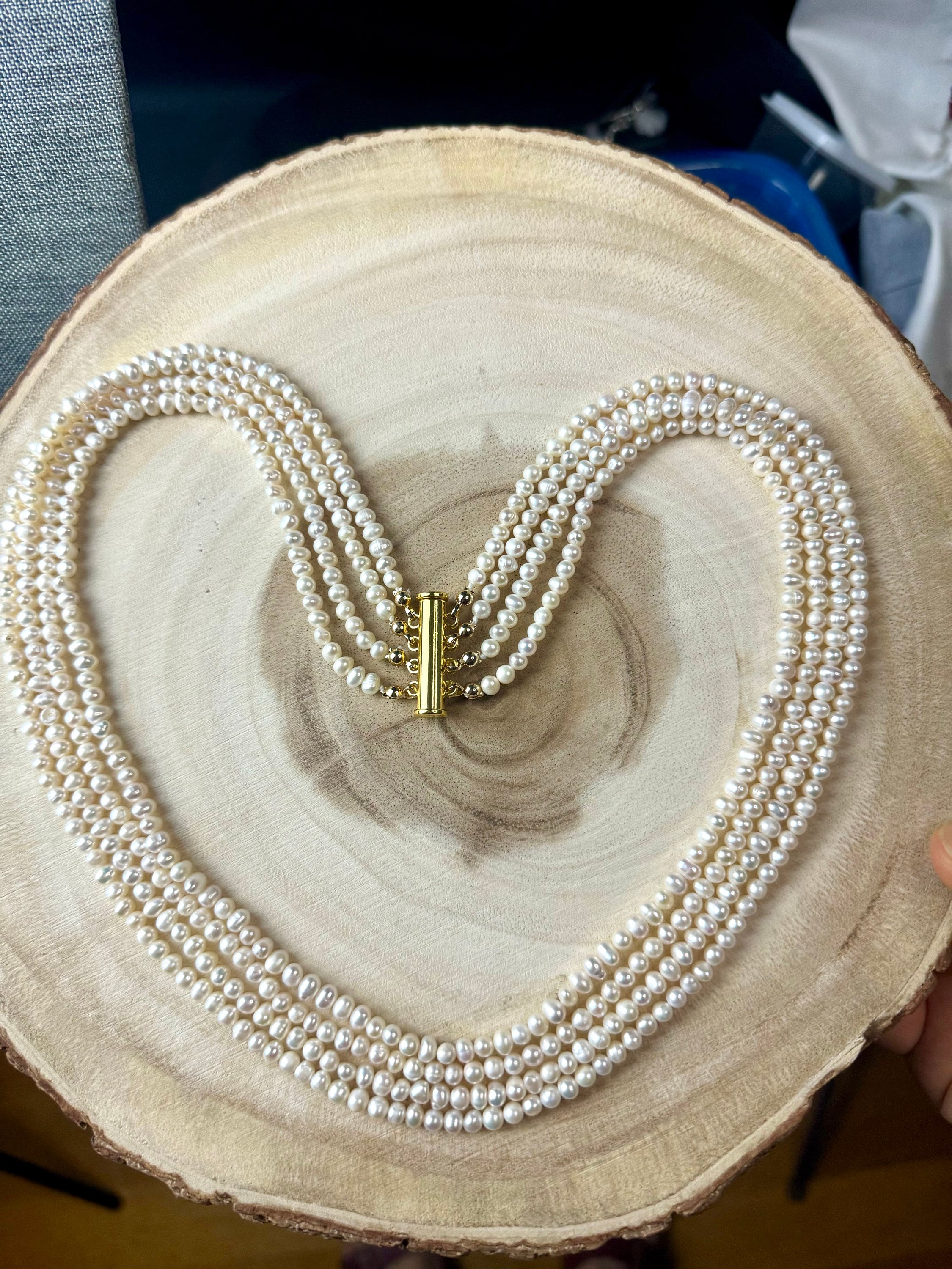 Freshwater pearl multi strand necklace. 4-5mm  baroque pearls with gold/silver clasps.