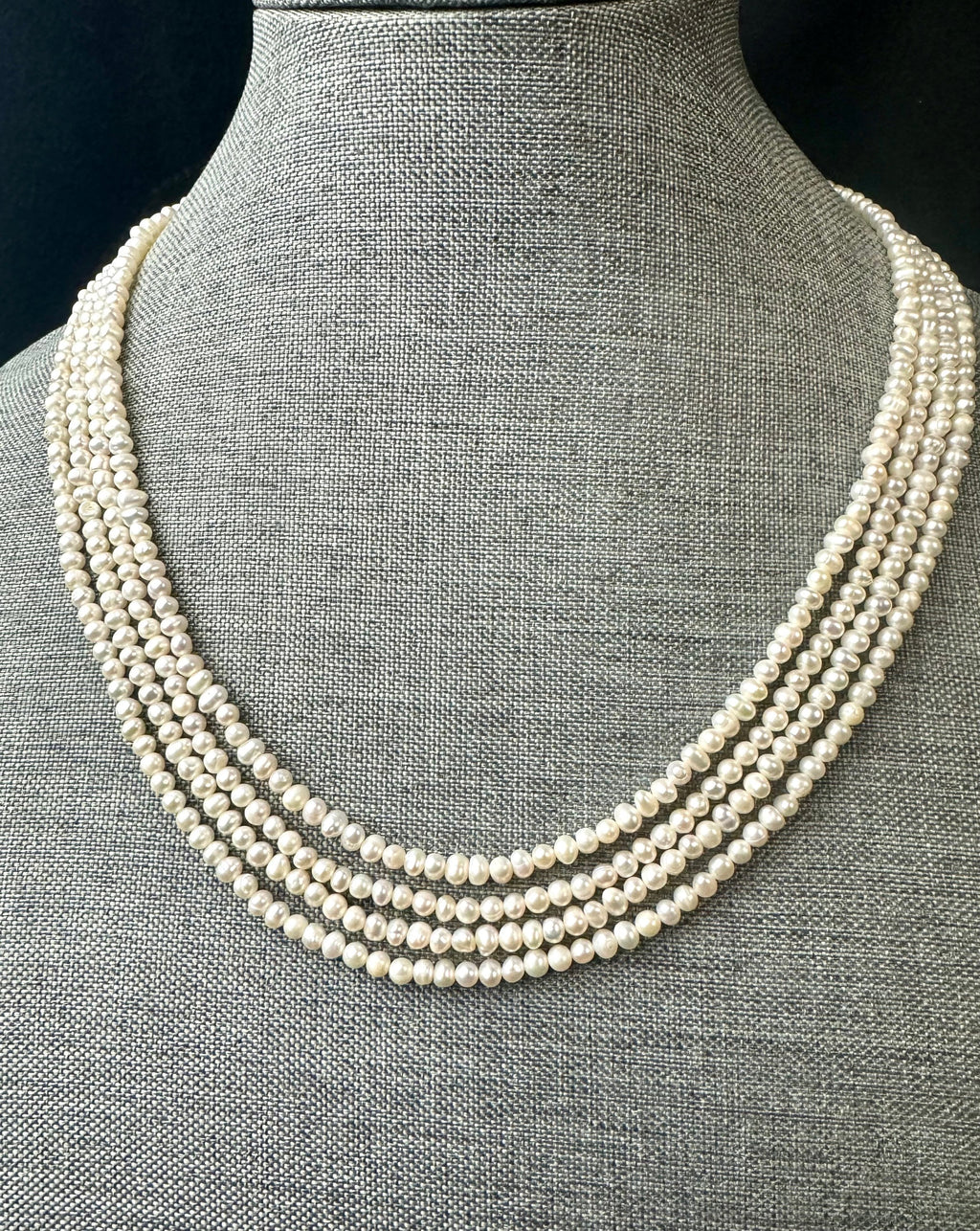 Freshwater pearl multi strand necklace. 4-5mm  baroque pearls with gold/silver clasps.