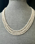 Freshwater pearl multi strand necklace. 4-5mm  baroque pearls with gold/silver clasps.