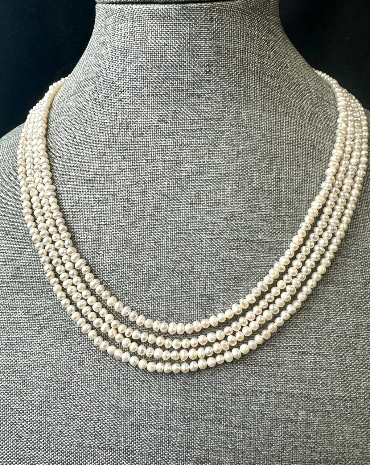 Freshwater pearl multi strand necklace. 4-5mm  baroque pearls with gold/silver clasps.