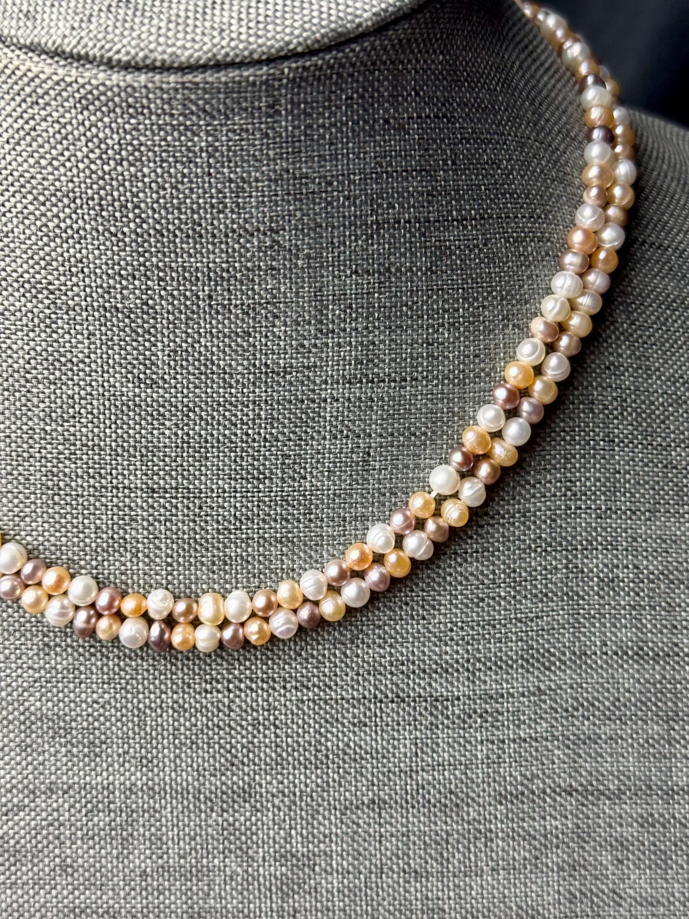 Freshwater pearl multi strand necklace. 4-5mm  baroque pearls with gold/silver clasps.