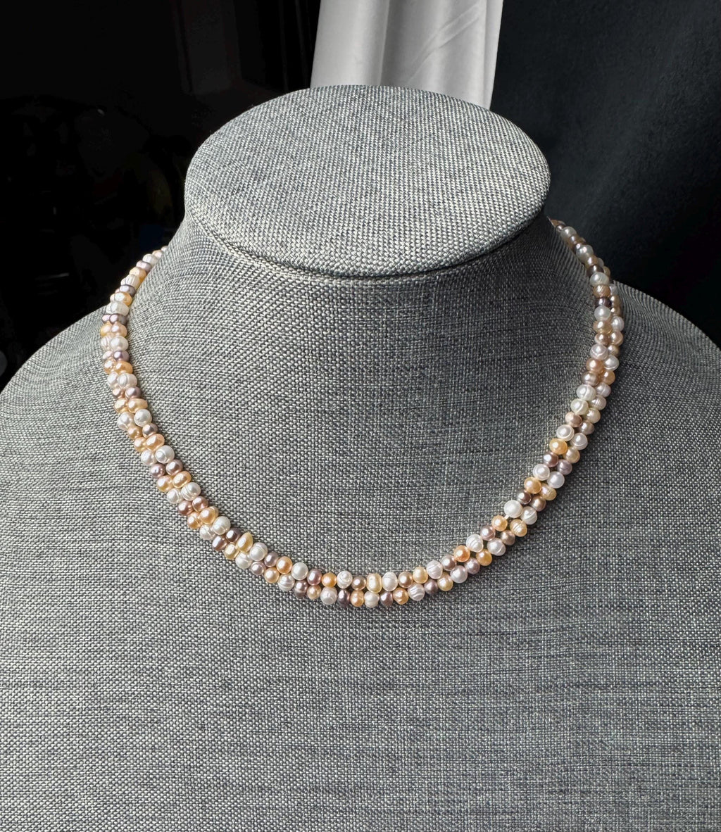 Freshwater pearl multi strand necklace. 4-5mm  baroque pearls with gold/silver clasps.