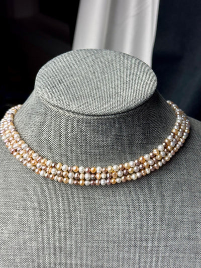 Freshwater pearl multi strand necklace. 4-5mm  baroque pearls with gold/silver clasps.